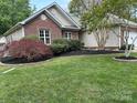 Well-maintained single-story home with brick accents, lush lawn, and tidy landscaping at 4608 Mabry Pkwy, Rock Hill, SC 29732
