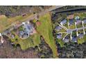 Expansive property with potential building sites, as shown by aerial view with surrounding residences at 6309 New Town Rd, Waxhaw, NC 28173