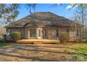 Spacious backyard featuring a new wooden deck perfect for outdoor entertaining at 103 Devonshire Ln, Salisbury, NC 28146