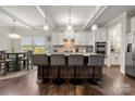 Bright and spacious kitchen featuring a large island, modern appliances, and an adjacent dining area at 1430 Whitman Ct, York, SC 29745
