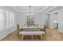 Elegant dining room with natural light and a modern farmhouse style table setting at 2017 Autumn Dr, Monroe, NC 28110