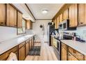 Well-lit kitchen featuring stainless steel appliances and ample cabinet space at 209 Vanderbilt Ave, China Grove, NC 28023