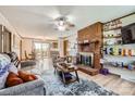 Inviting living room with a cozy brick fireplace and open floor plan at 209 Vanderbilt Ave, China Grove, NC 28023