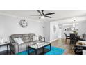 An open living room featuring a comfortable seating area and a dining area at 318 Lake Montonia Rd, Kings Mountain, NC 28086