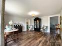 Comfortable living room featuring stylish decor, hardwood floors, and ample natural light at 7514 Secrest Shortcut Rd, Indian Trail, NC 28079