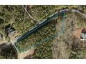 Aerial view of a wooded home lot for sale, outlining the property lines along a quiet street at 105 Southern Horizon Dr, Statesville, NC 28677