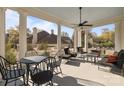 Outdoor seating with a ceiling fan, white columns, and furniture at 1212 Queens Rd, Charlotte, NC 28207