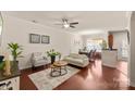 Inviting living area with hardwood floors, natural light, and stylish decor elements at 4528 Craigmoss Ln, Charlotte, NC 28278