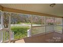 Covered porch provides beautiful views and a relaxing outdoor space at 61 Brown Sw St, Concord, NC 28027
