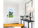 Welcoming foyer with a decorative console table and a large mirror; bright and inviting space at 1234 Wendall Ln, Mount Pleasant, NC 28025