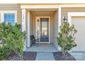 Close-up of the front door with sidelights and a welcoming entrance at 128 Stibbs Cross Rd, Mooresville, NC 28115