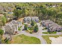 Overhead view showcasing charming townhomes nestled within a serene, wooded area at 1386 21St Ne Ave, Hickory, NC 28601