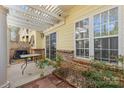 Cozy outdoor patio area with pergola and brick accents, ideal for relaxation at 1386 21St Ne Ave, Hickory, NC 28601