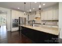 Spacious kitchen with stainless steel appliances, granite countertops, and a large island at 1495 Imperial Ct, York, SC 29745