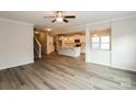 Spacious living room featuring hardwood floors, an open layout, and an abundance of natural light at 326 Nantucket Way, Rock Hill, SC 29732