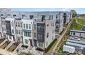 Modern townhome exteriors showcase varied textures, individual entrances, and elevated roof decks at 631 W Tremont Ave, Charlotte, NC 28203