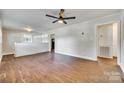 Spacious living room features hardwood floors, a ceiling fan, and lots of natural light at 764 Emorywood Ln, Rock Hill, SC 29730