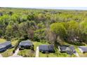 An aerial view showcases the home nestled amongst lush greenery at 116 Ridgewood Dr, York, SC 29745