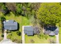 An aerial view showcases the home nestled amongst lush greenery and adjacent homes at 116 Ridgewood Dr, York, SC 29745