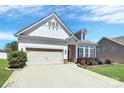 Attractive single-Gathering home featuring a spacious driveway and an attached two-car garage at 1224 Horsesugar Rd, Clover, SC 29710