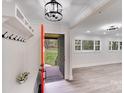 Inviting foyer with a view to the front yard and coat rack that flows into a spacious living area at 2109 Tarlton Dr, Matthews, NC 28105