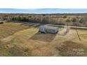 Expansive aerial view of the home, showcasing its location and surrounding landscape at 525 Mt. Wesley Church Rd, Hiddenite, NC 28636