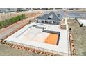 Aerial view of community pool construction with clubhouse and parking lot at 2252 Tabor Rd # 575, Sherrills Ford, NC 28673