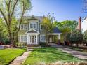 Charming two-story home with a well-manicured lawn, inviting entrance, and convenient covered carport at 547 Ashby Dr, Davidson, NC 28036