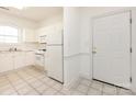 Bright, functional kitchen featuring white cabinets and essential appliances at 9287 Meadow Vista Rd, Charlotte, NC 28213