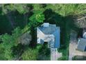 Aerial shot of the home showcases its mature trees and sprawling lot at 1353 33Rd Avenue Ne Dr, Hickory, NC 28601