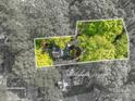 Aerial view showcasing the property's boundaries surrounded by mature trees, ensuring privacy and tranquility at 1220 Oakwood Ave, Gastonia, NC 28052