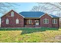 Beautiful brick house with a welcoming front porch and well-maintained lawn at 28926 Hartsell Rd, Albemarle, NC 28001