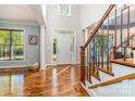 Bright foyer with hardwood floors and staircase at 4511 Morning Dove Ct, Denver, NC 28037