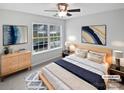 Bedroom featuring a large window providing natural light, neutral decor, and ample space at 78162 Rillstone Dr, Lancaster, SC 29720