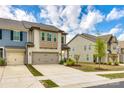 Attractive townhouse with a two-car garage and well-maintained landscaping at 3021 Patchwork Ct, Fort Mill, SC 29708