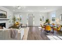 Bright, stylish living room featuring hardwood floors, a fireplace, and modern furniture at 68 Cabarrus W Ave, Concord, NC 28025