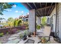 Inviting patio with gorgeous landscaping and exterior access at 9025 J M Keynes Dr # 69, Charlotte, NC 28262