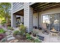 Cozy patio space with outdoor furniture and lush landscaping at 9025 J M Keynes Dr # 69, Charlotte, NC 28262