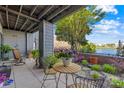 Charming patio featuring lovely landscaping, views, and outdoor seating at 9025 J M Keynes Dr # 69, Charlotte, NC 28262