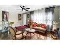 Inviting living area with hardwood floors, bright natural light, neutral wall color, and elegant furnishings at 1110 S New Hope Rd, Gastonia, NC 28054