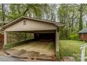 Spacious detached carport for parking and storage at 119 E End Ave, Statesville, NC 28677