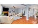 Inviting living room features a fireplace, hardwood floors, and neutral color palette at 2005 Dunsmore Ln, Waxhaw, NC 28173