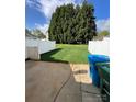 Large backyard with a privacy fence and potential for outdoor entertaining at 2006 Cramerton Village Dr # 31-D, Cramerton, NC 28032