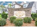 Beautiful stone sign marking the entrance to the Poplar Cove neighborhood at 2676 Poplar Cove Nw Dr, Concord, NC 28027