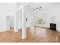Bright and airy living room with wood floors, fireplace, and lots of light at 3002 Enderbury Dr, Indian Trail, NC 28079