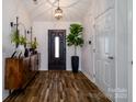 Welcoming foyer features beautiful wood flooring and leads to the home's interior at 4002 Shadow Pines Cir, Indian Trail, NC 28079