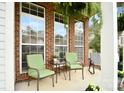 Relaxing porch with comfortable seating and plenty of natural light at 6301 Baberton Ct, Charlotte, NC 28269