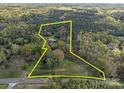 Aerial view showing property boundaries amid lush greenery, highlighting privacy and natural surroundings at 11170 Nc Hwy 73 E Hwy, Mount Pleasant, NC 28124