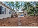 Spacious yard featuring a stone path with a wooden fence at 2749 Old Nation Rd, Fort Mill, SC 29715