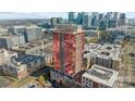 Exterior aerial shot of a pink glassed tower with surrounding city views at 315 Arlington Ave # 705, Charlotte, NC 28203